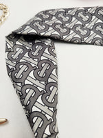 Load image into Gallery viewer, Handmade grey logo print hair secure headband
