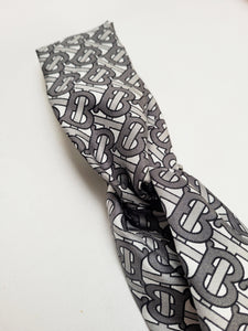 Handmade grey logo print crossed hair holder secure headband