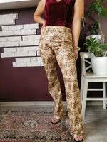 Load image into Gallery viewer, Vintage 90s animal print shimmer Kitsch flare leggings pants
