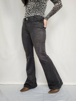 Load image into Gallery viewer, Vintage 90s black faux suede mid waist flare pants
