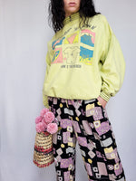 Load image into Gallery viewer, Vintage 90s light green graphic print oversized sweatshirt
