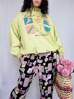 Load image into Gallery viewer, Vintage 90s light green graphic print oversized sweatshirt
