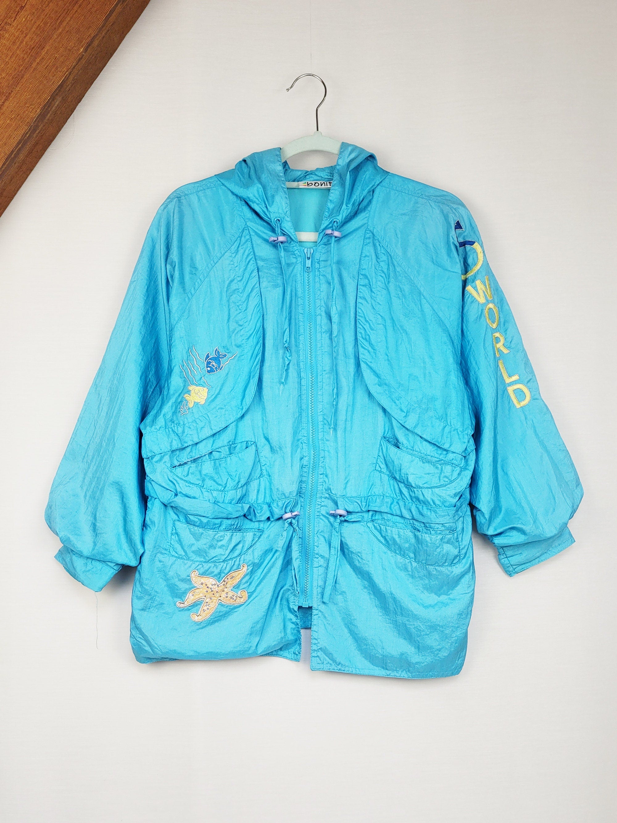 Vintage 90s blue embroidered shell hooded windbreak jacket