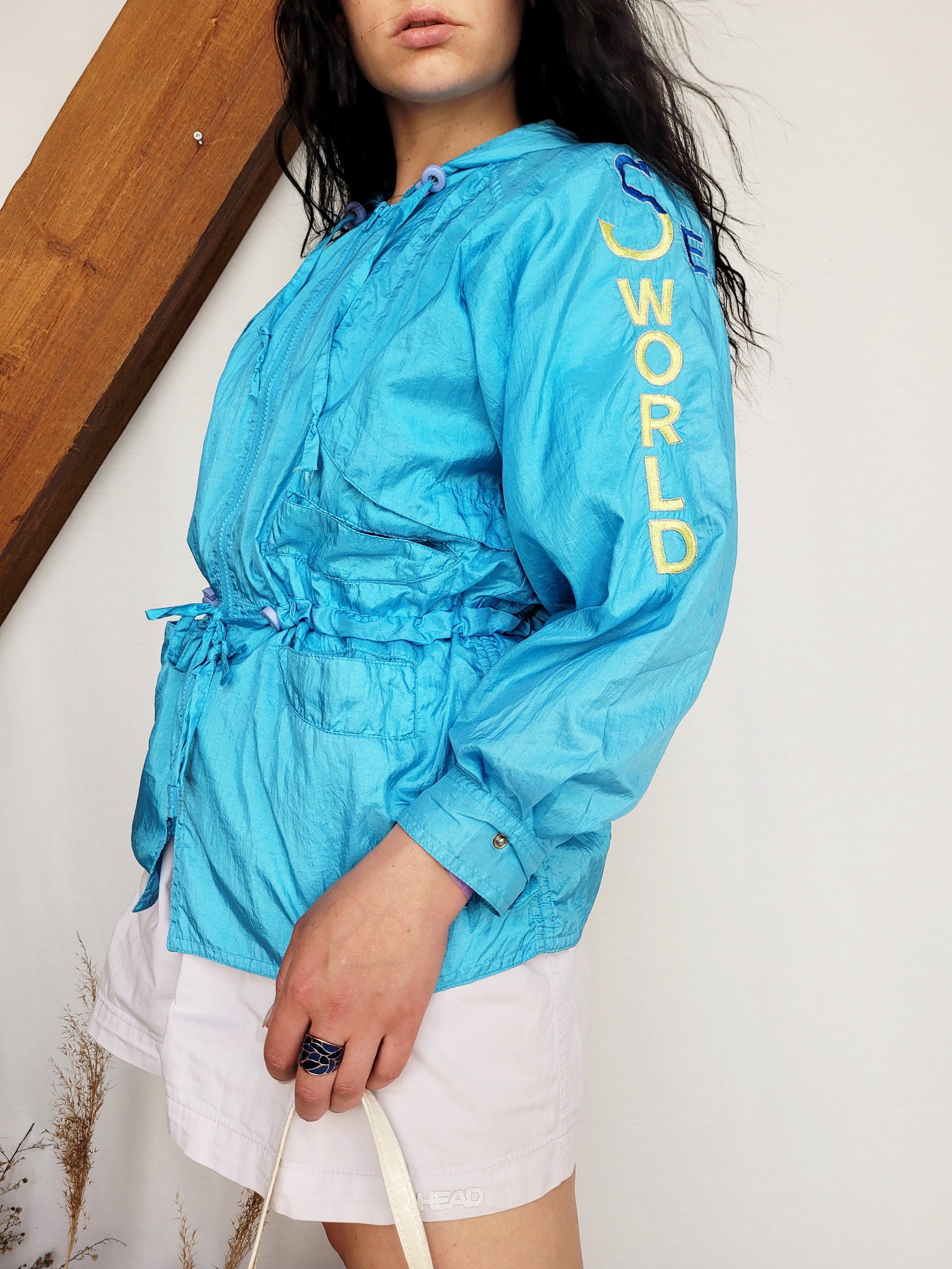 Vintage 90s blue embroidered shell hooded windbreak jacket