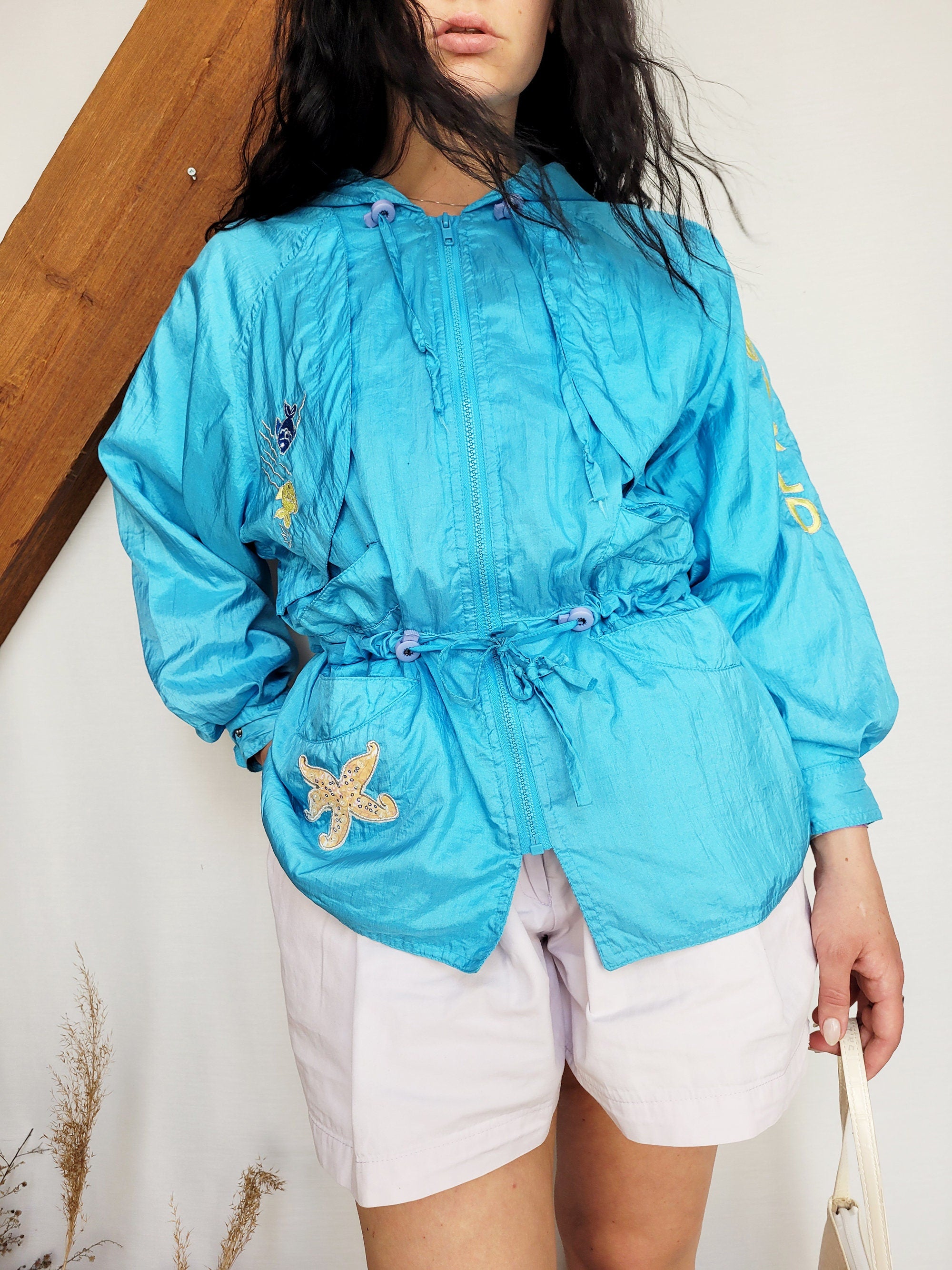 Vintage 90s blue embroidered shell hooded windbreak jacket