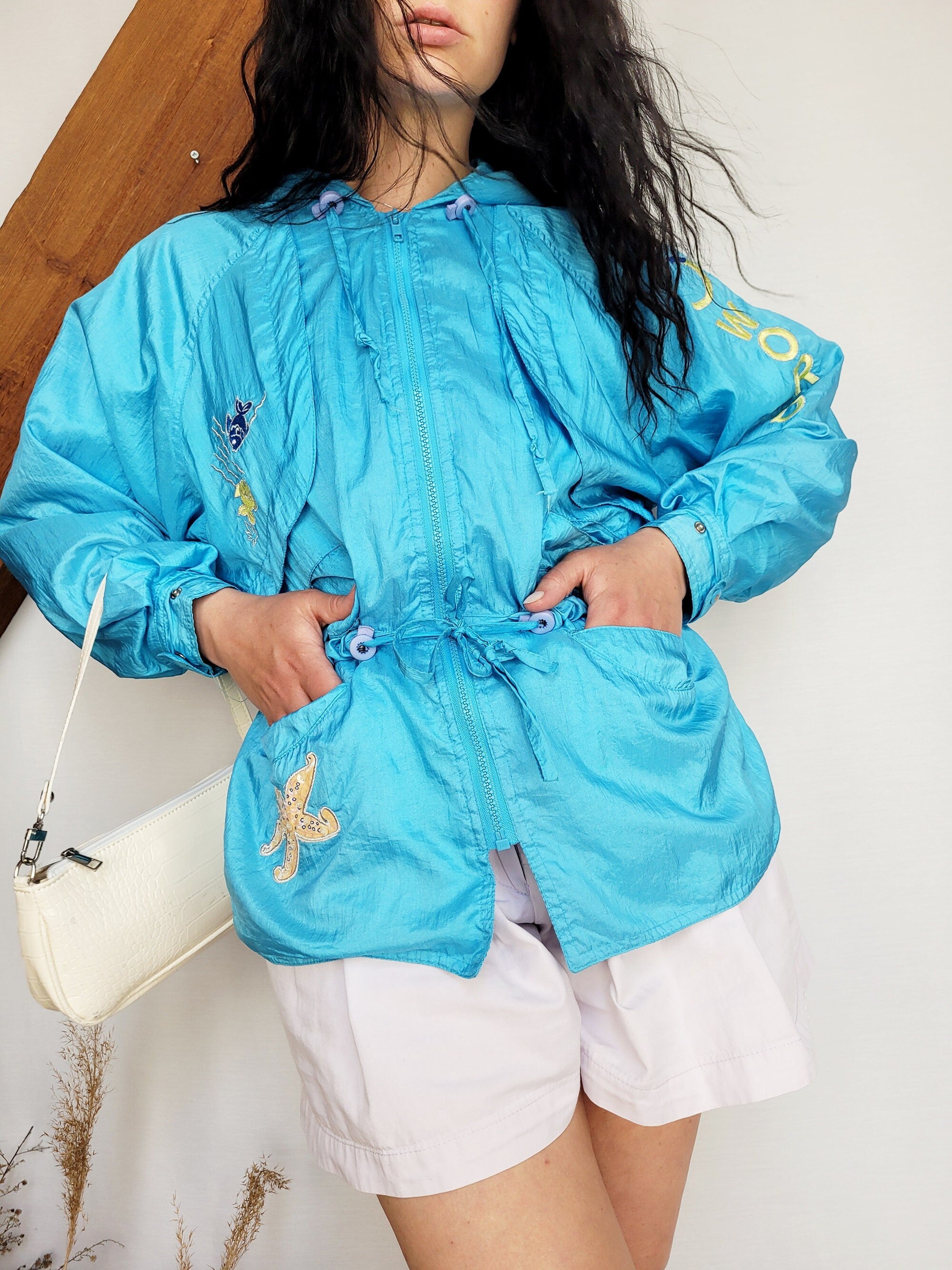 Vintage 90s blue embroidered shell hooded windbreak jacket