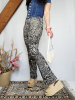 Load image into Gallery viewer, Vintage 90s grey animal print stretch flare pants
