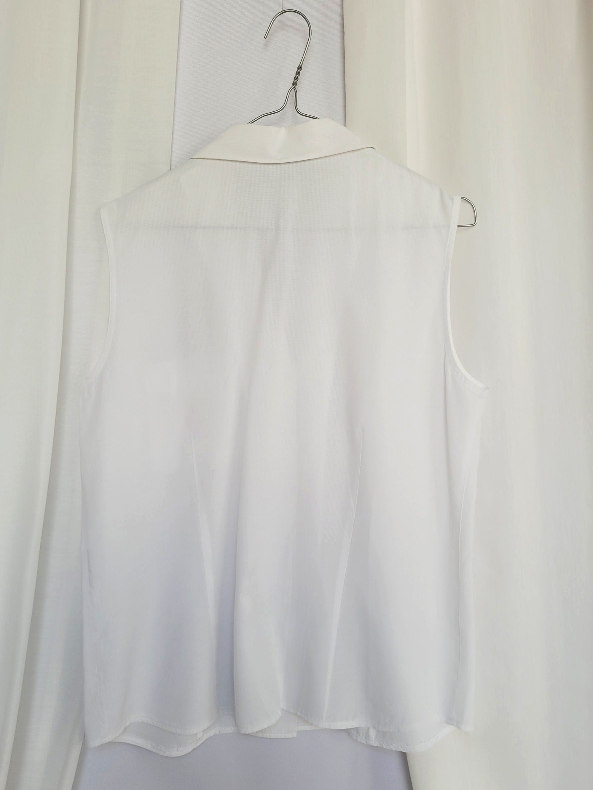 Retro 90s white minimalist sleeveless smart casual blouse